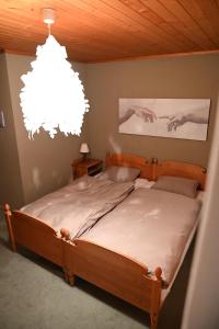 Postel nebo postele na pokoji v ubytování Auberge de l'Ange