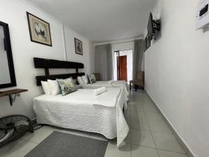 a bedroom with two beds in a room at Sister's Haven in Nelspruit