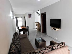 TV a/nebo společenská místnost v ubytování Kite Star Lodge, La Gaulette