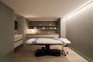 a hospital room with a bed in the corner at Catalonia La Maquinista in Barcelona