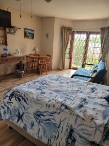 Postel nebo postele na pokoji v ubytování Fig Tree Manor Self Catering