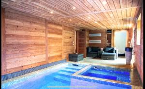 Les Clarines D'Or,Villa avec Piscine,Jacuzzi et Sauna , Aux pieds des Pistes de Ski , pour 12 personnes
