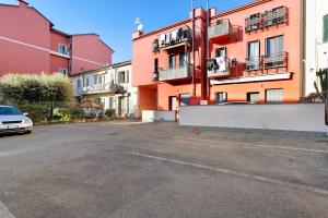 an empty parking lot in front of a building at La casetta di Ale in La Spezia