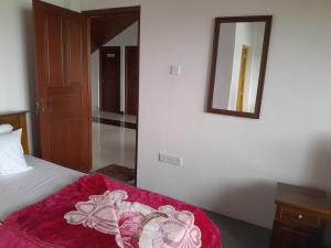 Letto o letti in una camera di Creek View Inn