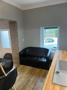 Χώρος καθιστικού στο Benny & Bella Guest House