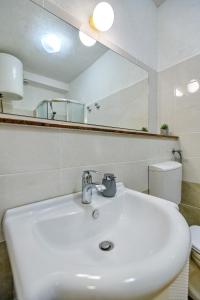 Koupelna v ubytování Apartman KALI + 23 fotografií
