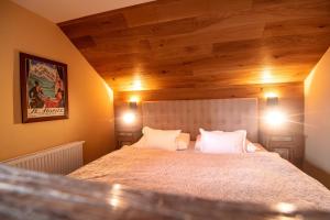 Voodi või voodid majutusasutuse Šumava Inn toas