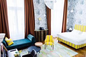 Postel nebo postele na pokoji v ubytování Small Luxury Hotel Altstadt Vienna