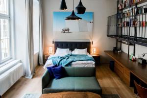 Postel nebo postele na pokoji v ubytování Small Luxury Hotel Altstadt Vienna