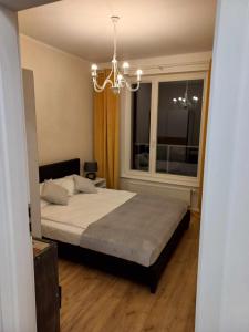 En eller flere senge i et værelse på JBHotels Malczewskiego