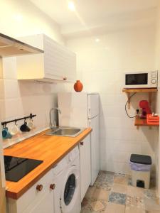 Kuchyň nebo kuchyňský kout v ubytování Acogedor Apartamento Centro Historico