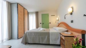 Postel nebo postele na pokoji v ubytování Hotel Nobel - Soft All Inclusive