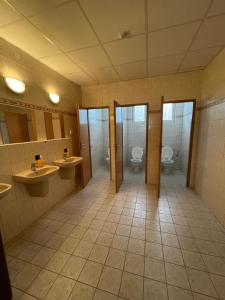 a bathroom with two sinks and two toilets at Harrachov 624 in Harrachov