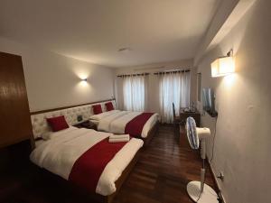Letto o letti in una camera di Sichu Chhen