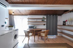 Кухня или мини-кухня в Primopiano - Colonne 67
