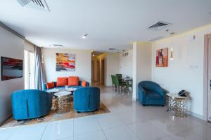 Ruang duduk di Wahaj Boulevard Hotel Apartmentوهج بوليفارد للشقق الفندقية