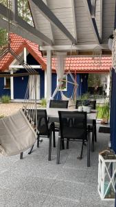 Patio nebo venkovní prostory v ubytování Stilo Domki