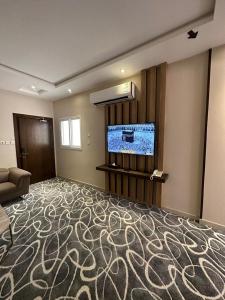 Televisor o centre d'entreteniment de Sunrise Suites