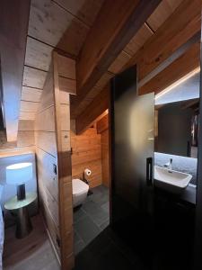 a bathroom with a sink and a toilet at Lux 12 in Sierra Nevada