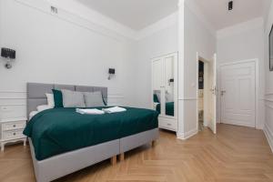 Posteľ alebo postele v izbe v ubytovaní Lwowska 9 - Cozy & Comfortable Studio by Noclegi Renters