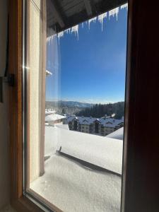 Fotografie z fotogalerie ubytování COZY ski-to-door apartment, Monastery 3 complex v destinaci Pamporovo