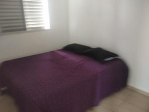 Postel nebo postele na pokoji v ubytování Apartamento bem localizado