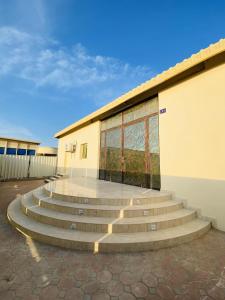 a group of stairs in front of a building at EK Homes in Ras al Khaimah