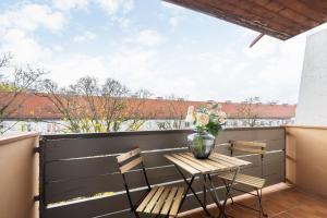 Ein Balkon oder eine Terrasse in der Unterkunft Homaris Apartments München Laim
