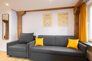Ein Sitzbereich in der Unterkunft Homaris Apartments München Laim