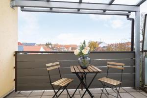 Ein Balkon oder eine Terrasse in der Unterkunft Homaris Apartments München Laim
