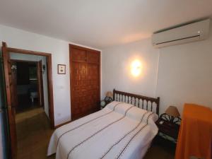 Postel nebo postele na pokoji v ubytování Nueva Playa