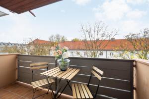Ein Balkon oder eine Terrasse in der Unterkunft Homaris Apartments München Laim