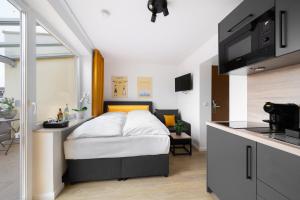 TV/Unterhaltungsangebot in der Unterkunft Homaris Apartments München Laim