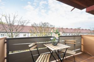 Ein Balkon oder eine Terrasse in der Unterkunft Homaris Apartments München Laim
