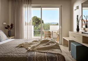 Voodi või voodid majutusasutuse Marelen Hotel Zakynthos toas