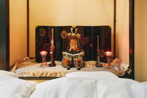 Postelja oz. postelje v sobi nastanitve Villa Hakone Kabuto 古民家旅館 150平米 バス停迄一分 準天然温泉 最大12名