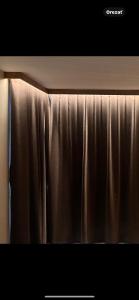 a close up of a brown curtain at Penzión Holub in Banská Bystrica