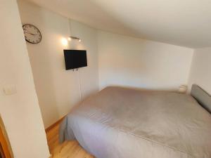 Ένα ή περισσότερα κρεβάτια σε δωμάτιο στο Appartement 2 chambres Terrasse