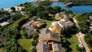 an aerial view of a house with a lake at Résidence Paese Serenu in Porto-Vecchio