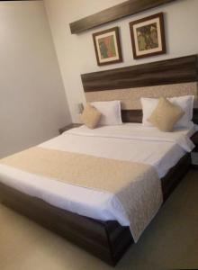 Postel nebo postele na pokoji v ubytování Hotel Kristal