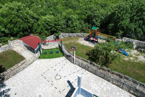 an aerial view of a park with a playground at Villa Smajo in Kotlenice