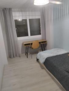 Ένα ή περισσότερα κρεβάτια σε δωμάτιο στο Casa Tower
