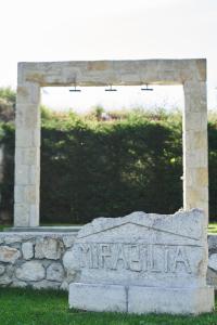 a stone sign for the university of michigan at Mirabilia Boutique Hotel in Kriopigi