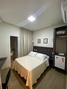 Katil atau katil-katil dalam bilik di Hotel Recanto dos Ipes