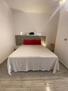 Postel nebo postele na pokoji v ubytování Alloggi di Alessandro