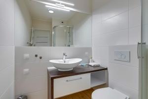 Kúpeľňa v ubytovaní Apartament Nadmorskie Spektrum & Parking