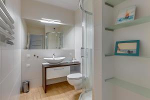 Kúpeľňa v ubytovaní Apartament Nadmorskie Spektrum & Parking