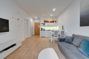 Kuchyňa alebo kuchynka v ubytovaní Apartament Nadmorskie Spektrum & Parking