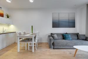 Kuchyňa alebo kuchynka v ubytovaní Apartament Nadmorskie Spektrum & Parking