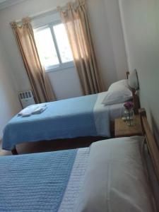 Cama ou camas em um quarto em ALBERDI centro MENDOZA